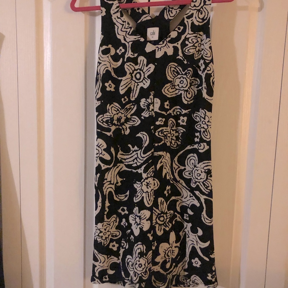 Cute summer t-back dress. Shorter in the front. A little longer in the back.